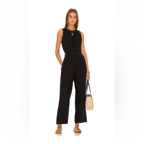 Black jumpsuit! Used for a one time event,washed,cleaned and ready to go!
